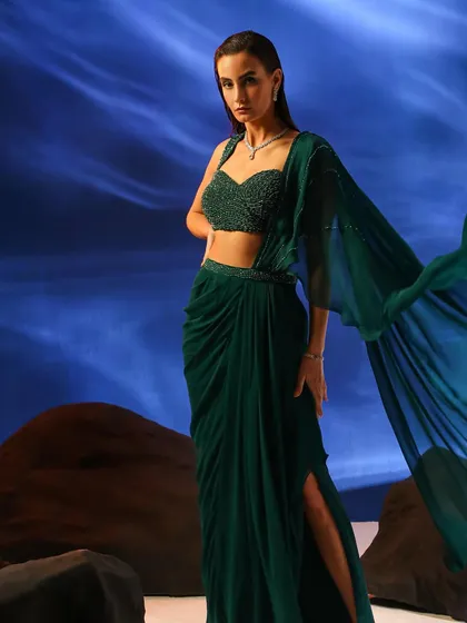 For this fashion campaign, I styled an elegant, modern ethnic look. The flowing emerald green fabric and intricate beaded blouse highlight my expertise in creating dramatic and memorable visuals for contemporary Indian wear brands.
