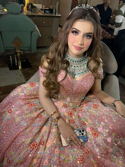 This princess is ready for the ball. The makeup is flawless, and she looks absolutely radiant.