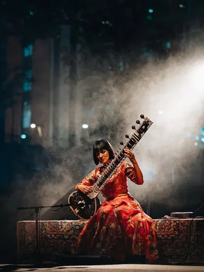 Anoushka Shankar, captured in a moment of quiet intensity during her 'Chapters' tour. This image showcases our versatility, moving from high-energy rock to producing intimate, atmospheric concerts for world-renowned classical and fusion artists.