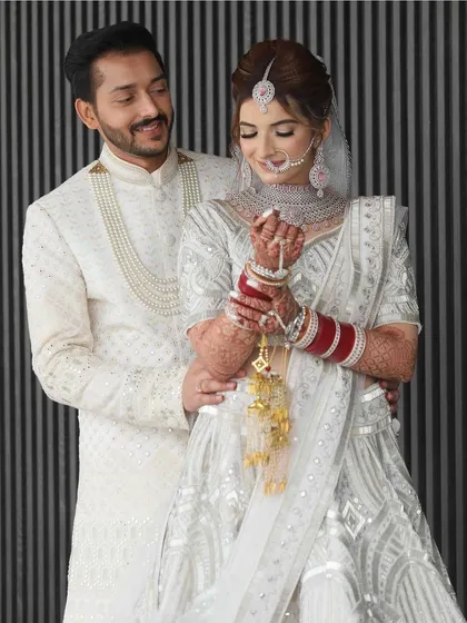 A sweet and romantic moment captured between the newlyweds. The bride looks serene and beautiful, and I'm so happy I could contribute to her special day.
