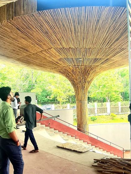 Our team on-site at the TAPMI Centre, overseeing the installation of the bamboo cladding. This hands-on involvement is crucial to ensuring the design intent is realized with precision and craft.