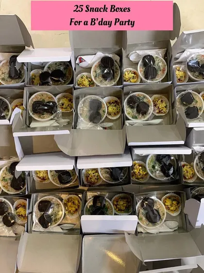 Another angle of the 25 snack boxes, showing the consistent and neat packaging.