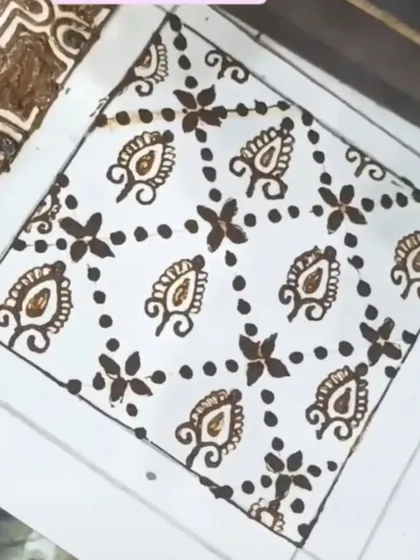 A simple but elegant filler pattern using dots and small paisley motifs.