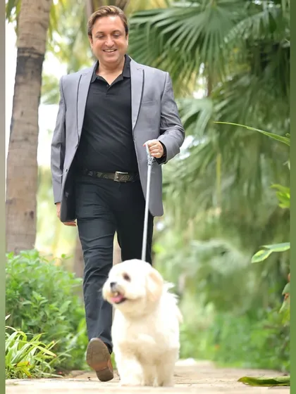 A lifestyle shot of veteran actor Sanjev Sharma walking his dog. This type of image helps to show a more personal, relatable side of an actor.