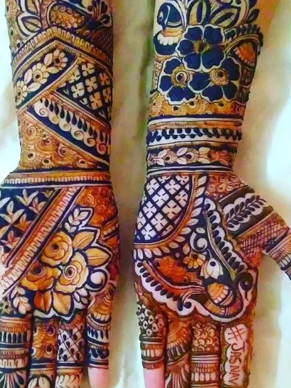 A very bold and dark design with prominent floral motifs. The use of negative space makes the flowers stand out.