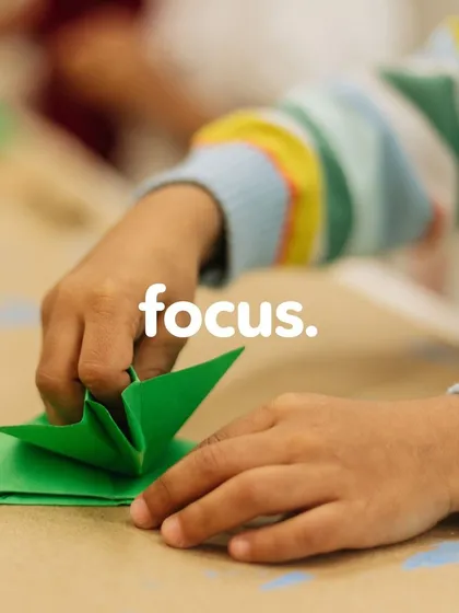 Little Devansh is completely engrossed in the art of origami. Each focused fold transforms a simple piece of paper into a butterfly, teaching patience and precision.