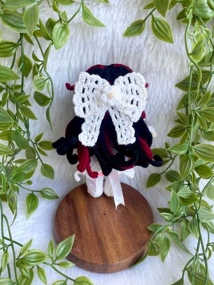 This is Columbina Damselette, a beautifully detailed anime character. The intricate hairstyle with red and black locks and the delicate white dress was a challenge I truly enjoyed creating.