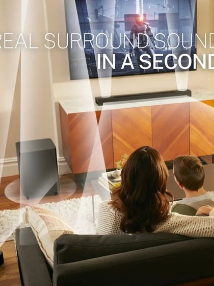 This graphic demonstrates how the JBL 9.1 soundbar provides "real surround sound in a second." By placing the detachable wireless speakers behind you, the system instantly creates an immersive audio environment.