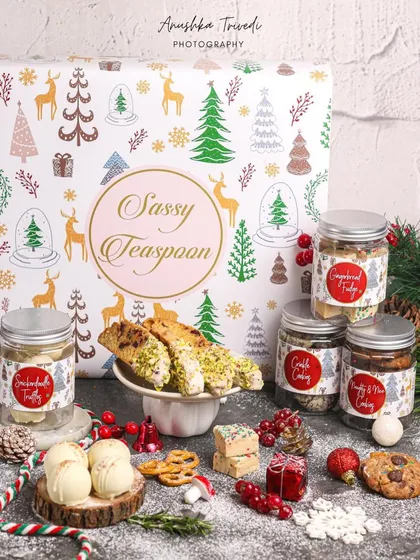 Capturing the magic of Christmas with a festive hamper from Sassy Teaspoon. I used classic holiday props like miniature trees, berries, and a dusting of "snow" to create a whimsical winter wonderland scene.