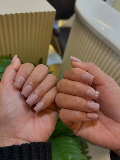 The clean lines of the square shape combined with a perfect nude polish create a timelessly chic manicure.
