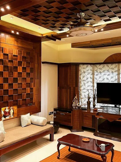 We have a deep appreciation for woodwork, and this living room is a prime example. The feature wall and ceiling are crafted from wood blocks in a complex checkerboard pattern, creating a stunning visual texture that is both artistic and architectural.