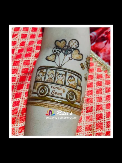 A close-up of the 'Coming Soon' bus on the arm.
