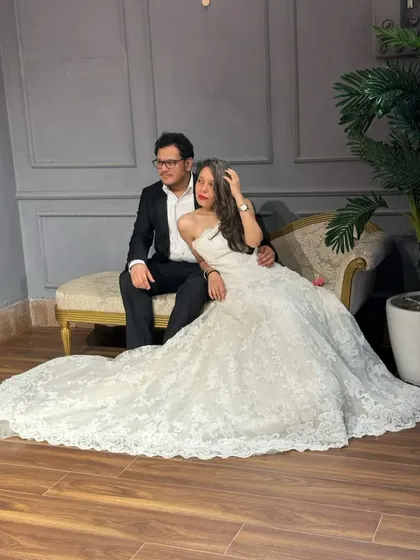 Your fairytale moment awaits. We styled this couple for their pre-wedding shoot with our classic white lace ballgown and a sharp black suit for a timeless, romantic look.