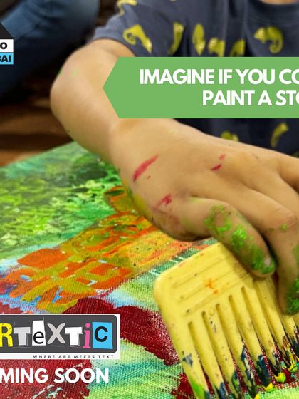 A teaser image for our "Artextic" exhibition, where art meets text. The image of a child's paint-covered hand on a canvas hints at the expressive, story-driven work to come.