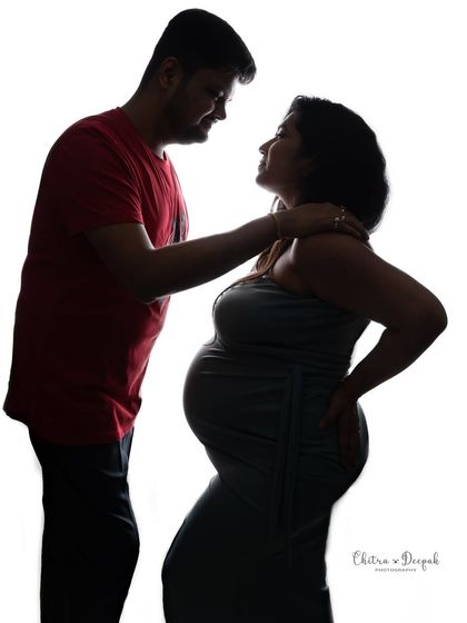 An intimate silhouette of a couple. This high-contrast technique creates a timeless and emotional portrait, focusing purely on their connection.