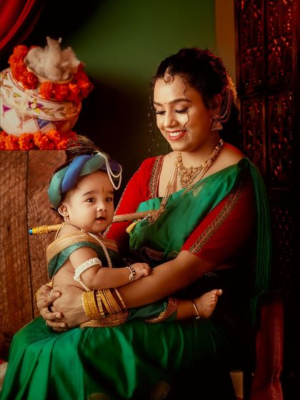 A tender moment between a mother and her baby Krishna, showcasing the deep connection and love.