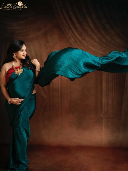 The wind-swept saree effect is one of my favorite techniques for adding drama and elegance to a maternity portrait. She styled her bump with so much grace.