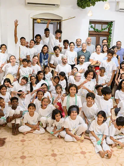 This is our tribe, our family. This photo captures the incredible community we've built, full of students of all ages and backgrounds, celebrating together. When you join our classes, you're not just learning moves; you're becoming part of a supportive and energetic family.