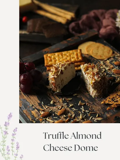 Our Truffle Almond Cheese Dome. This close-up shot highlights the rich texture and nutty coating of this luxurious and flavorful cheese creation.