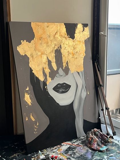 The finished gold leaf portrait in my studio, surrounded by the beautiful mess of creation.