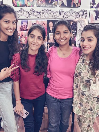 A group of friends posing for a photo at my studio.