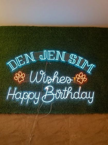 Our custom neon sign is the perfect backdrop for birthday photos. It adds a special touch to every celebration we host.