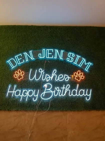 Our custom neon sign is the perfect backdrop for birthday photos. It adds a special touch to every celebration we host.