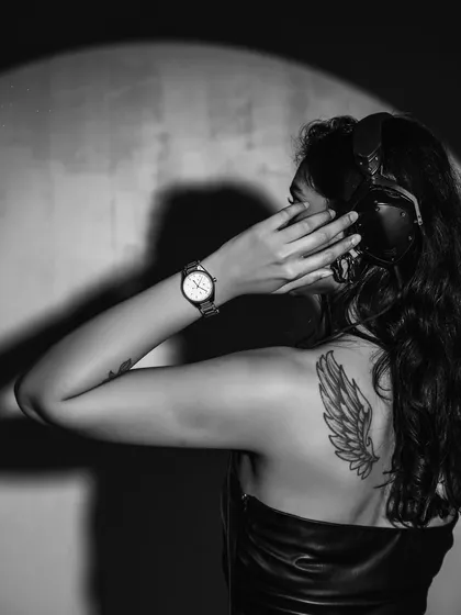 A black and white shot from my collaboration with Armani Exchange. This photo, showing my wing tattoo, was part of the campaign for their latest watch collection.