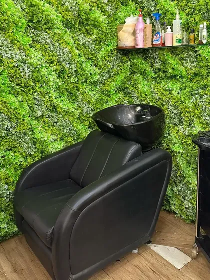 My hair wash station, set against our calming green wall. It's a perfect spot to relax and enjoy a soothing hair wash.