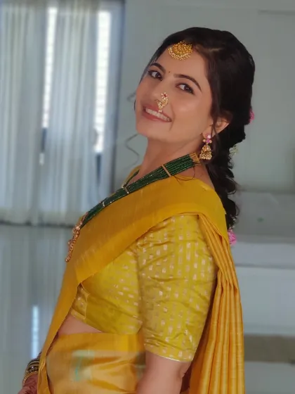 A happy, smiling shot of Nidhi. It's so much fun to mix and match traditions and create unique fusion looks for my clients.