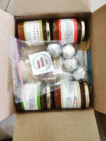 This is what you will see when you open your Pikkle Shikkle box. We make sure every jar is secure and your sweets are protected so they arrive in perfect condition.