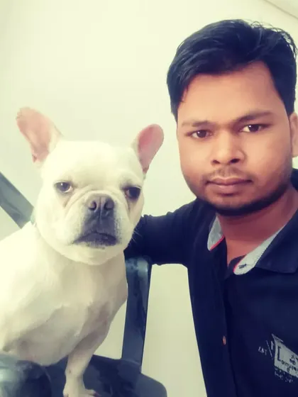 This is me with a beautiful French Bulldog, a very popular breed for city living. I love connecting people with the right dog for their lifestyle, and I am always here to answer your questions.