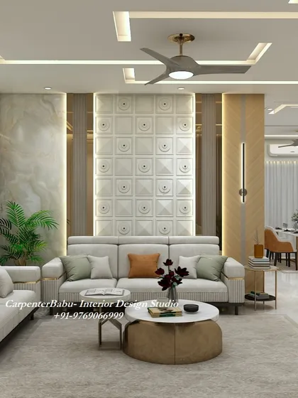 A full view of the living room, showing the cohesive design that blends different textures and materials like marble, wood, and 3D panels.