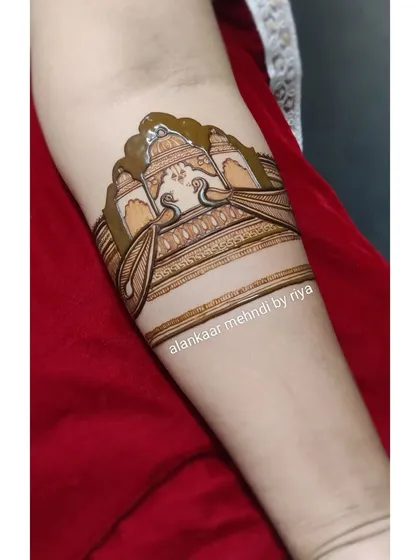 The design begins to take shape as I add shading and the first layer of details to the palace and peacock outlines.