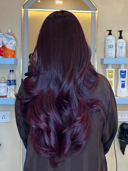 A Violet Flame hair makeover. This unique, multidimensional violet hue is eye-catching and full of character, making a bold yet sophisticated statement.