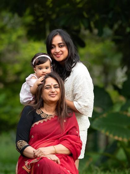 A closer view of this beautiful three-generation portrait. The love and connection between grandmother, mother, and baby are so clear and heartwarming.
