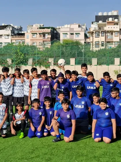 A group photo of our academy players. This is the family we have built through discipline and a shared passion for football.