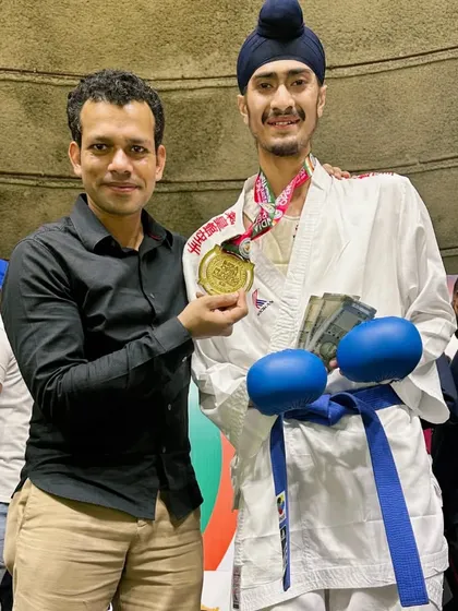 With my coach, Aniket Sir, after winning the India Open. His presence and support are a constant source of strength during competitions.