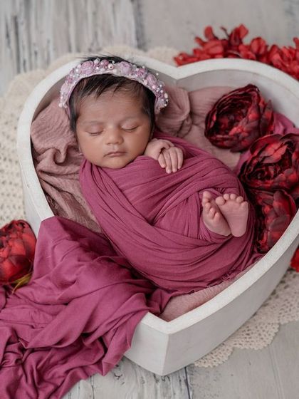 Tiny but mighty. The way this baby's little feet poke out of the swaddle is one of those adorable details I always look for.
