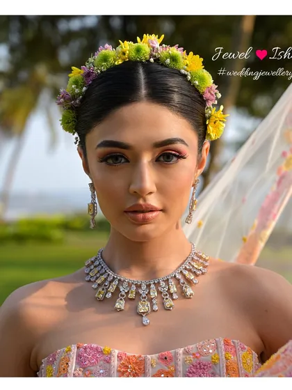 Your Mehendi look should be fun and vibrant. Here, I paired a modern diamond and yellow topaz necklace with a colourful, floral-themed outfit. It's a fresh, contemporary take on pre-wedding jewellery that is both chic and playful.