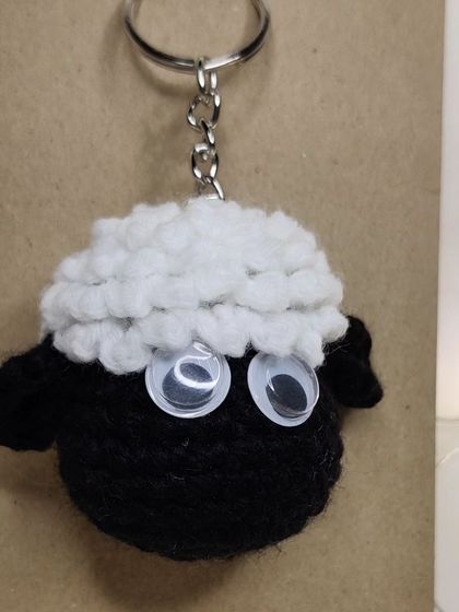 Shaun the Sheep keychains. I make them as a couple, one with a little bow, perfect for you and your bestie.