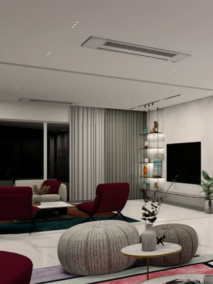 This render for the Gulecha Residence shows an informal living area designed for comfort. Plush, oversized ottomans and deep-seated chairs in rich red tones create a cozy atmosphere for family gatherings and relaxation.