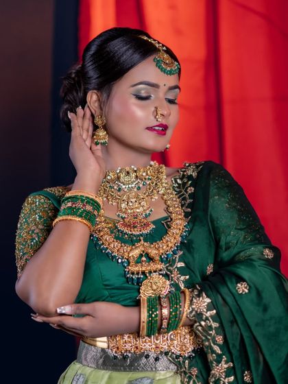 A green lehenga look I demonstrated for my students. I teach them how to work with bold colors and heavy jewellery.