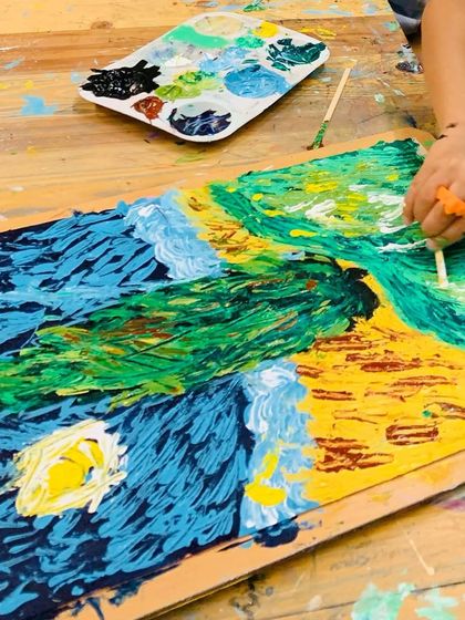 Another student's interpretation of a Van Gogh landscape, with swirling skies and vibrant fields.