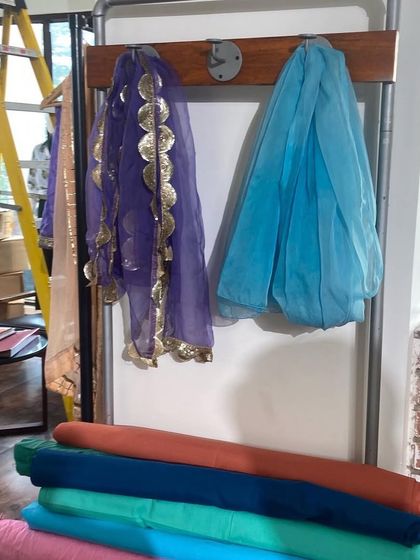 More behind-the-scenes prep, showing fabrics and dupattas selected for various scenes. Sourcing the right materials is a critical step in building authentic character wardrobes.