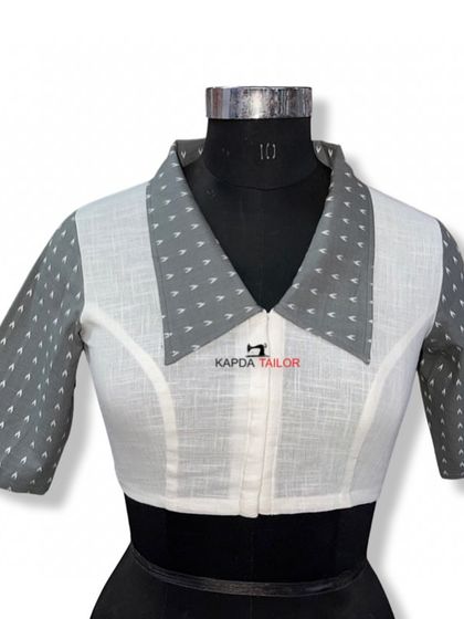 This collared, two-tone blouse is an example of the custom designs I can manufacture for your retail business. Let's collaborate to create your next collection.