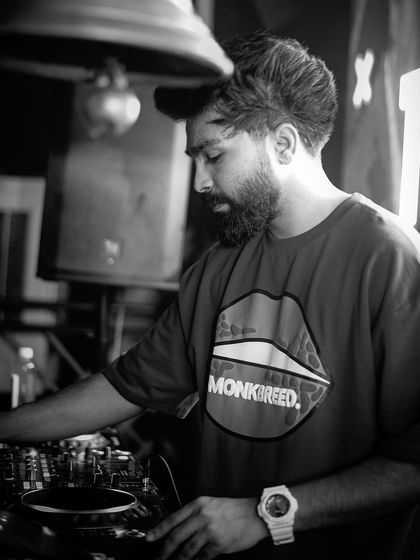 A black and white shot of me at the console. The focus is purely on the music and the craft.