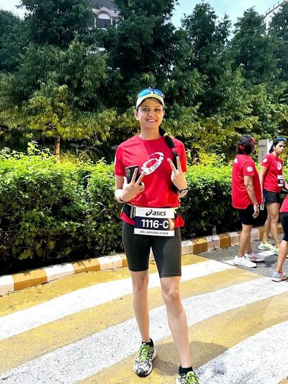 A participant looking happy and confident during the ASICS Gel Kayano 31 launch run. We help our runners achieve their personal bests.