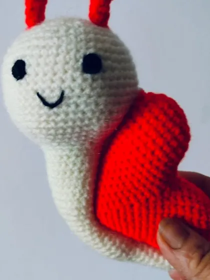 A closer look at my handmade snail with a heart shell. A unique way to show your love.