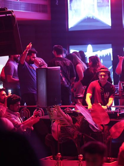 A wider shot from a gig, showing my setup and the crowd in the background.